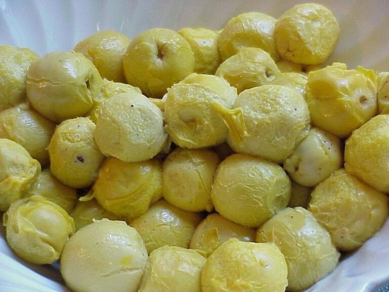 hog plum Ximenia americana ripe fruit in a bowl ready to use for jam